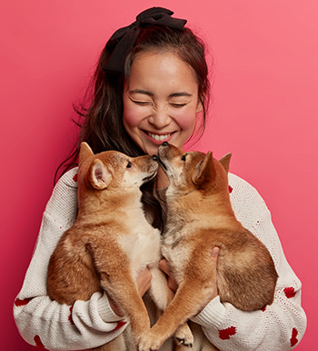Girl with Puppies